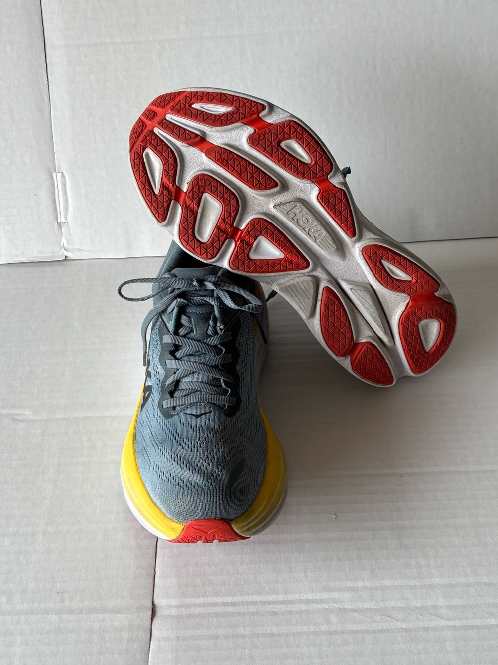 HOKA Men’s Gray With Yellow Soles in Size 10.5 in excellent condition.